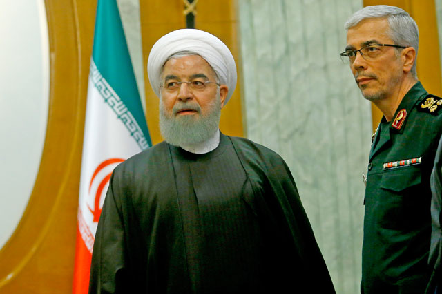 Iranian President Hassan Rouhani (left) and General Staff of the Armed Forces of Iran Mohammad Bagheri (right) are seen before a meeting with Turkish President Recep Tayyip Erdogan (not seen) in Sochi, Russia, on Wednesday (Anadolu Agency)