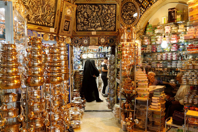 Iranian women shop at Tehran's ancient Grand Bazaar in Tehran on Saturday (AFP photo)