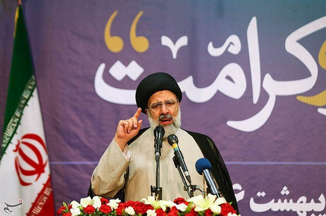 Ebrahim Raisi gestures in this undated handout photo provided by Tasnim News Agency on Tuesday (Reuters photo)