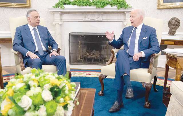 US President Joe Biden speaks with Iraqi Prime Minister Mustafa Al Kadhimi in the Oval Office of the White House in Washington, DC, Monday (AFP photo)
