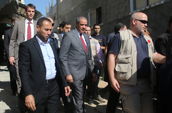 Ralph Tarraf (centre), European Union representative, visits with international diplomats the Beit Hanoun town in the northern Gaza Strip Tuesday (Reuters photo)