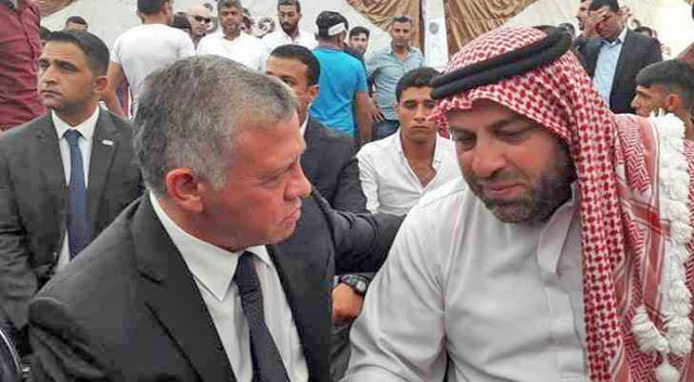 In this file photo, His Majesty King Abdullah comforts the father of Mohammad Jawawdeh, who was killed by an Israel embassy employee at a residential building rented by the Israeli embassy in Amman in July 2017 (File photo)