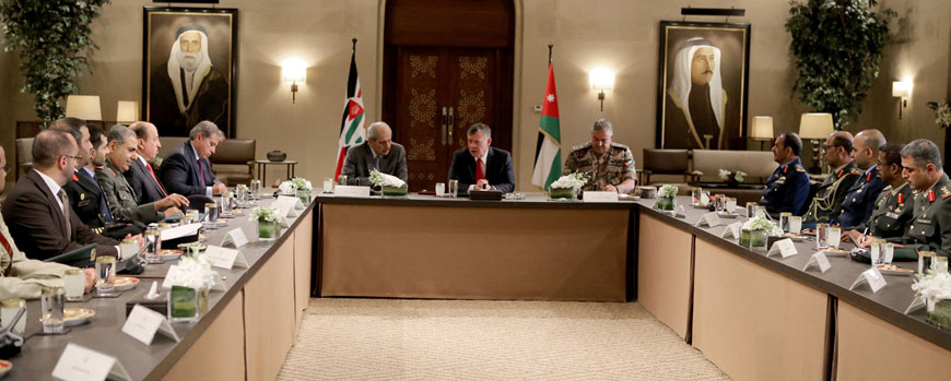 His Majesty King Abdullah meets with a delegation from the National Defence College in the United Arab Emirates in Amman on Sunday (Photo courtesy of Royal Court)