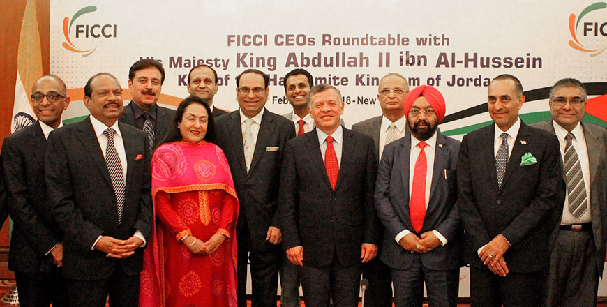 His Majesty King Abdullah poses for a group photo with top Indian businesspeople at a roundtable meeting in New Delhi last week (Photo courtesy of Royal Court)