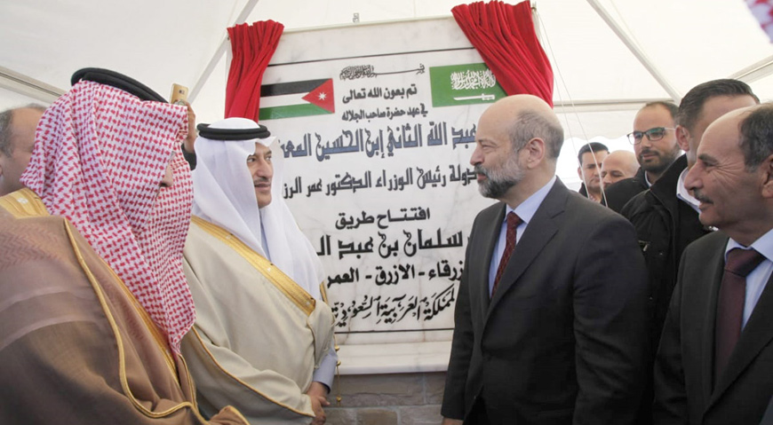 Prime Minister Omar Razzaz (right) inaugurates the opening of King Salman Bin Abdulaziz Street in this photo taken on Monday. The project widened the road to four lanes and aims to facilitate traffic and trade (Petra photo)