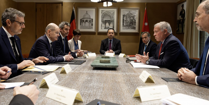 His Majesty King Abdullah and German Chancellor Olaf Scholz discuss the dangerous developments in Gaza during a meeting on Sunday in Aqaba, which was attended by HRH Crown Prince Hussein  (Photo of Royal Court)