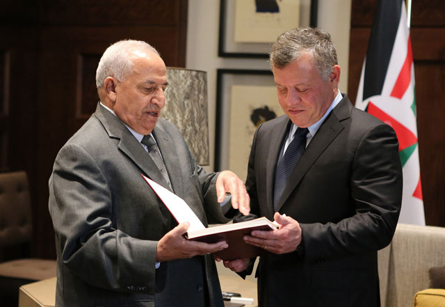His Majesty King Abdullah meets with Chairman of NCHR’s Board of Trustees Mohammad Bakhit at Al Husseiniya Palace  on Wednesday (Photo courtesy of Royal Court)
