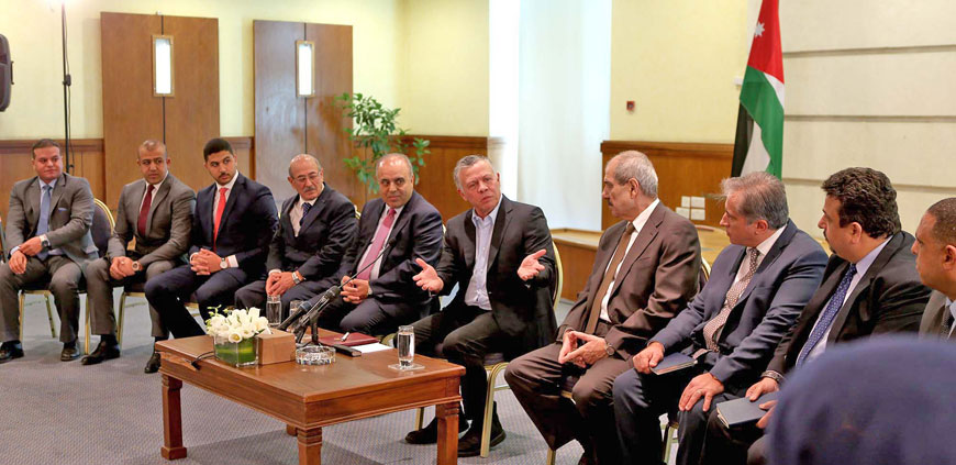 His Majesty King Abdullah meets with Jordan University students in Amman on Tuesday (Photos courtesy of Royal Court)