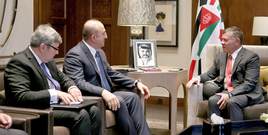 His Majesty King Abdullah meets with Turkish Foreign Minister Mevlut Cavusoglu in Amman on Monday (Photo courtesy of Royal Court)