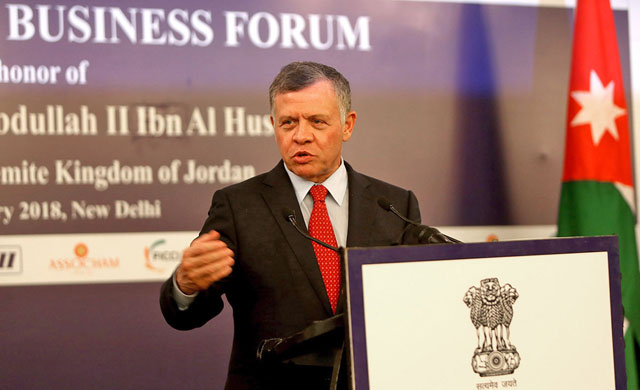 His Majesty King Abdullah addresses the Jordanian-Indian Business Forum meeting in New Delhi on Wednesday (Photo courtesy of Royal Court)
