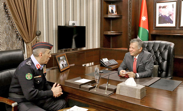 His Majesty King Abdullah meets with the Public Security Department Director Maj. Gen. Fadel Hmoud in Amman on Monday  (Photo courtesy of Royal Court)