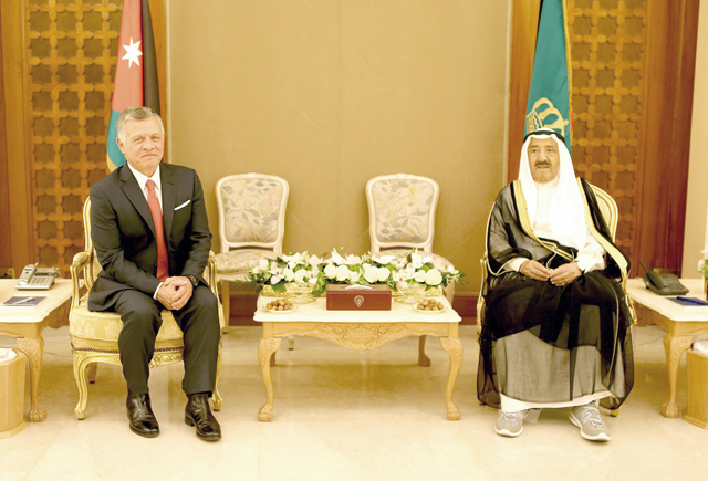 His Majesty King Abdullah meets with Emir of Kuwait Sheikh Sabah Al Ahmad Al Jaber Al Sabah in Kuwait on Tuesday (Photo courtesy of Royal Court)