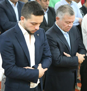 His Majesty King Abdullah and HRH Crown Prince Hussein join worshippers in the Eid Al Fitr prayer at the Royal Guards Mosque in Aqaba on Friday (Photo courtesy of Royal Court)