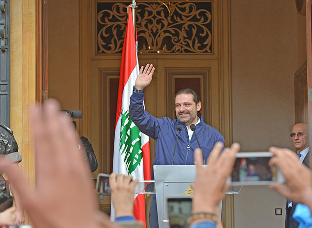Lebanese Prime Minister Saad Hariri greets his supporters during a press conference on his resignation at his residence in Beirut, Lebanon, on Wednesday (Anadolu Agency photo)