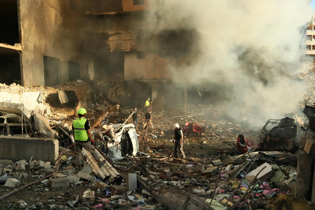 Rescuers search for survivors at the site of an Israeli airstrike that targeted the southern city of Nabatieh on November 16, 2024, amid the ongoing Israeli war on Lebanon  (AFP photo)