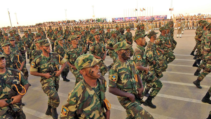 Soldiers from the self-styled army of Libyan strongman Khalifa Haftar take part in a military parade in Benghazi on May 7, during which Haftar announced a military offensive to take the city of Derna (AFP photo)