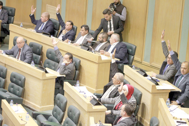 MPs vote as the Lower House ends a debate over medical malpractice law on Tuesday (Photo by Hassan Tamimi)