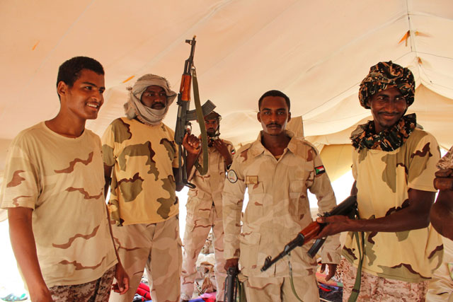 A photo taken during a tour organised by Yemeni loyalist forces backed by Saudi Arabia and the United Arab Emirates on June 2, shows Sudanese fighters battling longside Yemen's Saudi-backed pro-government forces against Houthi rebels in the province of Hodeidah (AFP photo)
