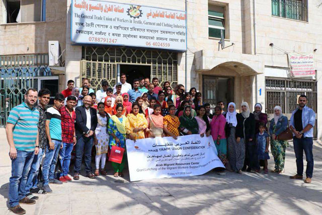 Stakeholders pose for a group photo at the project launch ceremony at the General Trade Union of Workers in Textile, Garment and Clothing Industries, on Friday (Photo courtesy of General Federation of Jordanian Trade Unions)