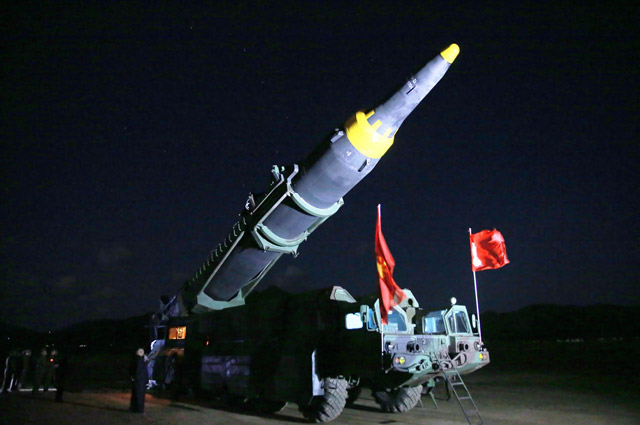 This photo taken on May 14 and released from North Korea's official Korean Central News Agency shows North Korean leader Kim Jong-un inspecting a  ground-to-ground medium long-range strategic ballistic rocket Hwasong-12 at an undisclosed location (AFP photo)