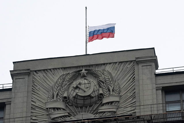 A photograph taken in Moscow on Saturday, shows the flag of Russia flying at half-mast on top of the Council of the Federation building, a after a gun attack on the Crocus City Hall in Krasnogorsk (AFP photo)