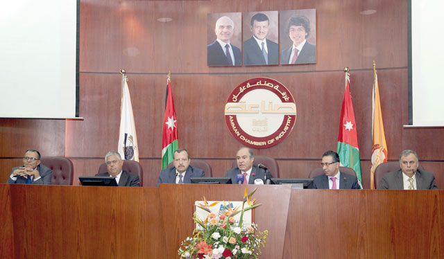 Prime Minister Hani Mulki speaks during a meeting with representatives of  industrial sector at the Jordan Chamber of Industry on Wednesday (Petra photo)