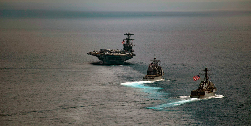 This image obtained from the US navy shows the aircraft carrier USS Carl Vinson (left) leading the Arleigh Burke-class guided-missile destroyer USS Michael Murphy (centre) and the Ticonderoga-class guided-missile cruiser USS Lake Champlain in the Indian Ocean on April 14 (AFP photo)
