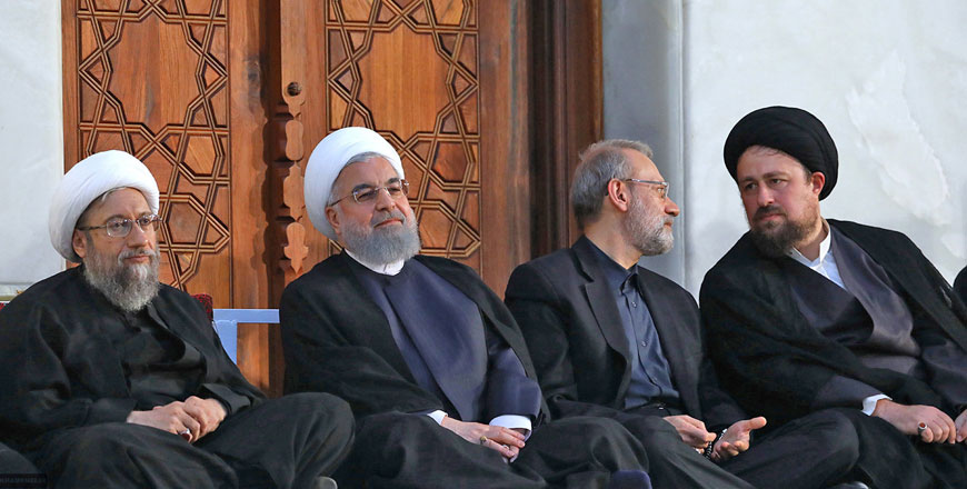 This handout photo provided by the office of Iran’s Supreme Leader Ayatollah Ali Khamenei on June 4, shows (left to right) Iranian judiciary chief Sadegh Larijani, Iranian President Hassan Rouhani, Parliament Speaker Ali Larijani and Hassan Khomeini,  during a ceremony on the occasion of 29th anniversary of Khumeini’s death at his shrine in southern Tehran (AFP photo)