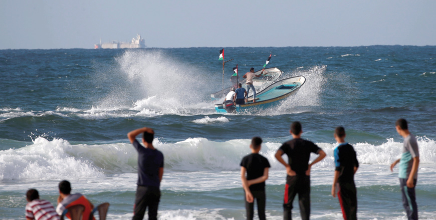 Palestinians ride boats during a protest against the Israeli blockade on Gaza at the sea in Gaza on Saturday (Reuters photo)
