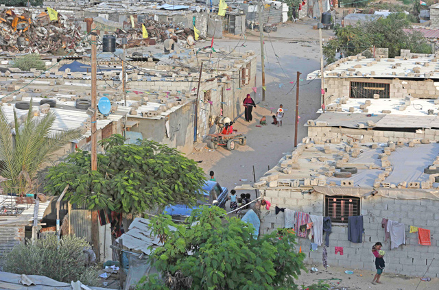 A general view shows an impoverished neighbourhood of the Khan Younis refugee camp in southern Gaza Strip on Saturday. The United States has cancelled more than $200m in aid for the Palestinians in the Gaza Strip and West Bank (AFP photo by Mahmud Hams)