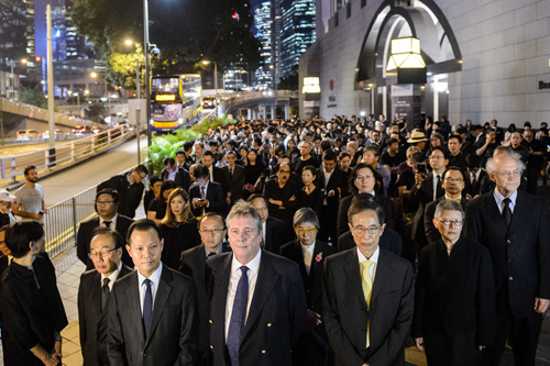 Members from the legal sector join other lawyers and law students in a silent march in protest at a ruling by China which effectively bars two pro-independence legislators from taking office in Hong Kong on Tuesday (AFP photo)