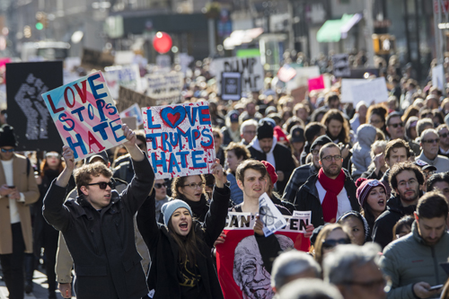 Demonstrators chant slogans as they march up 5th Avenue during a protest against the election of President-elect Donald Trump, on Saturday, in New York (AP photo)