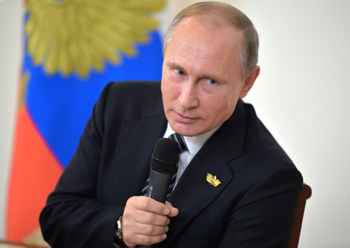Russian President Vladimir Putin speaks during the news conference following the meeting of the BRICS member states’ leaders at Taj Exotica hotel in Goa, on Sunday (AFP photo)