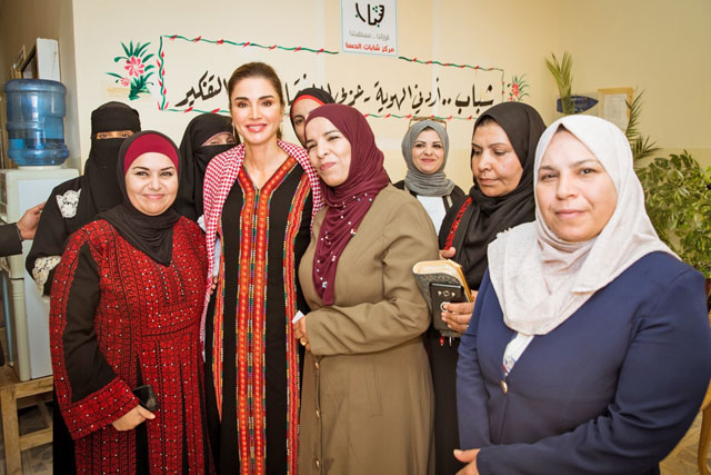 Her Majesty Queen Rania on Wednesday meets with the beneficiaries of a project aiming to improve the conditions of low-income families in Al Hasa in Tafileh (Photo courtesy of Royal Court)