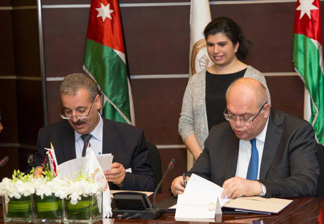 HRH Princess Sumaya, the Royal Scientific Society (RSS) president, and Public Works Minister Sami Halaseh attend a signing ceremony for quality control cooperation agreements between the Ministry of Public Works and Housing and the RSS on Sunday  (Petra photo)