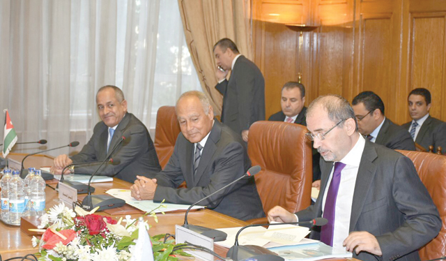 Foreign Minister Ayman Safadi addresses a meeting to follow up on the implementation of the Arab summit’s resolutions in Cairo on Tuesday  (Petra photo)