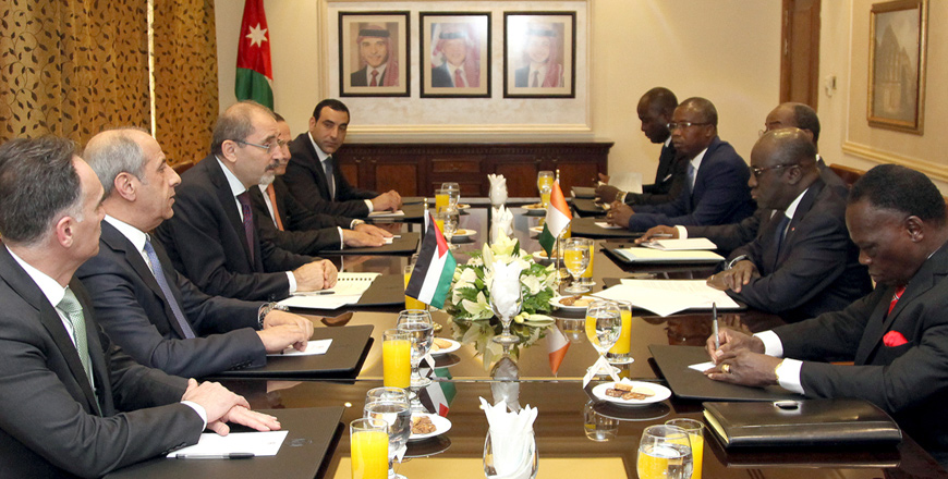 Foreign Minister Ayman Safadi meets with his Ivory Coast counterpart Marcel Amon Tanoh in Amman on Thursday (Petra photo)