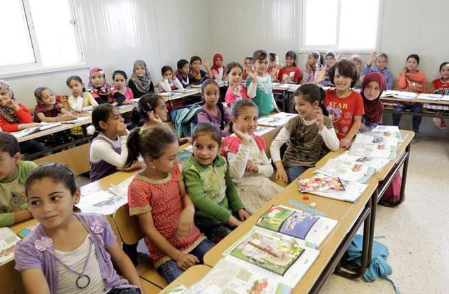 A number of schools around the Kingdom suffer from severe overcrowding that hinders the children’s learning process (AFP photo)