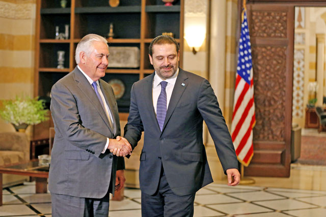 Lebanon's Prime Minister Saad Al Hariri shakes hands with US Secretary of State Rex Tillerson at the governmental palace in Beirut, Lebanon, on Thursday (Reuters photo)