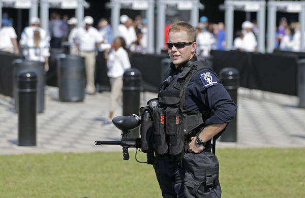 A Charlotte-Mecklenburg police officer stands guard outside Bank of America Stadium before an NFL football game between the Carolina Panthers and the Minnesota Vikings in Charlotte, North Carolina, on Sunday (AP photo)