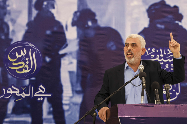 Head of the political wing of the Palestinian Hamas movement in the Gaza Strip Yahya Sinwar speaks during a meeting in Gaza City on April 30, 2022 (AFP photo)