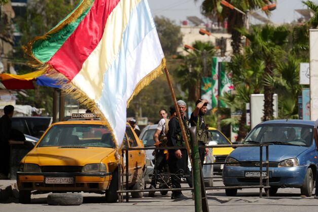 Druze security forces stand guard in Jaramana in the suburb of Damascus on April 29, 2025, following overnight sectarian clashes between Druze fighters and security forces loyal to Syria's new government (AFP photo)