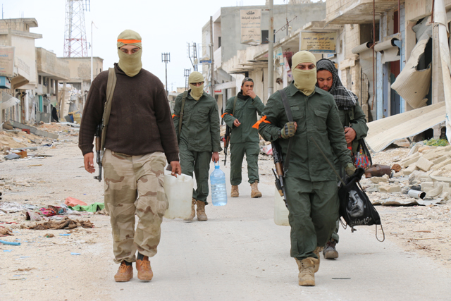 Free Syrian Army and other Syrian opponent groups get Suran district under control as they continue to attack Assad Regime Forces and break through the centre of Hama, Syria, on Wednesday (Anadolu Agency photo)