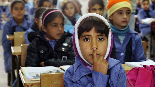 Children inside a classroom at Zaatri refugee camp, host to tens of thousands of Syrians displaced by conflict, near Mafraq  (Photo courtesy of UN)