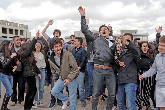 Students celebrate the announcement of Tawjihi results in Amman on Saturday (Photos by Osama Aqarbeh)