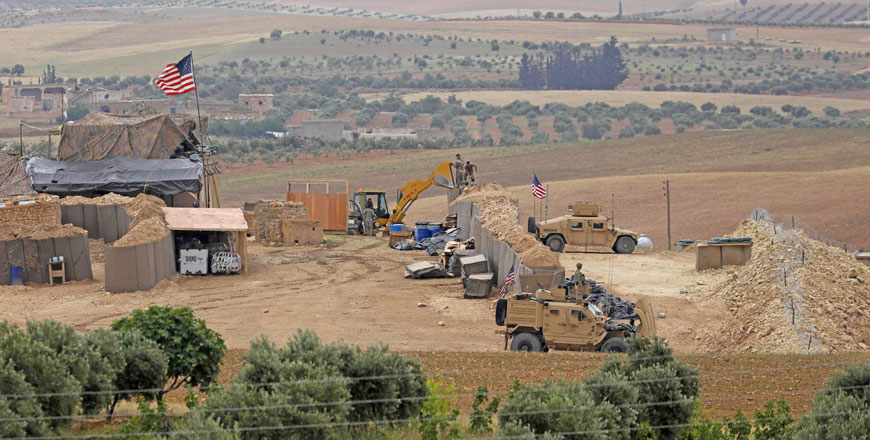 This photo taken on Tuesday shows vehicles and structures of the US-backed coalition forces in the northern Syrian town of Manbij (AFP photo)