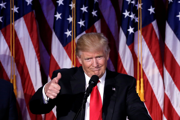 US President-elect Donald Trump gestures as he speaks at election night rally in Manhattan, New York, on Wednesday (Reuters photo)