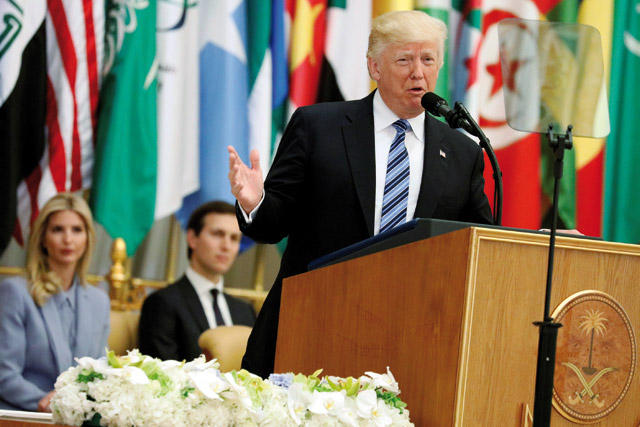 US President Donald Trump, flanked by Ivanka Trump and White House senior adviser Jared Kushner, delivers remarks to the Arab Islamic American summit in Riyadh, Saudi Arabia, on Sunday (Reuters photo)