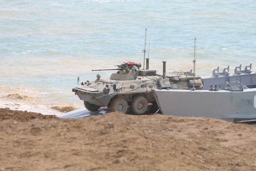 A photo released by the Russian Defence Ministry on April 22, 2021, shows Russian forces landing ashore during a military drill on the Kerch Peninsula in the Crimea (AFP photo)