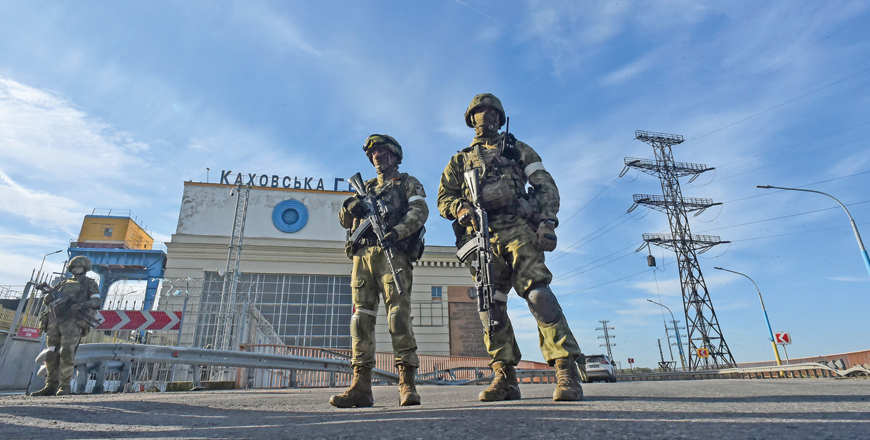 This photo, taken on Friday, shows Russian servicemen patrolling at the Kakhovka Hydroelectric Power Plant, Kherson Oblast, amid the ongoing Russian military action in Ukraine (AFP photo)